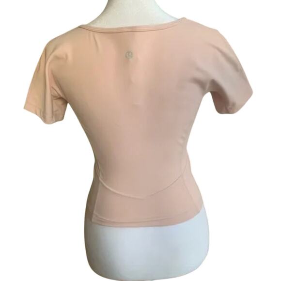 (4) $68 Lululemon Nulu Cropped Slim Yoga Short Sleeve Pink Mist - Picture 7 of 8